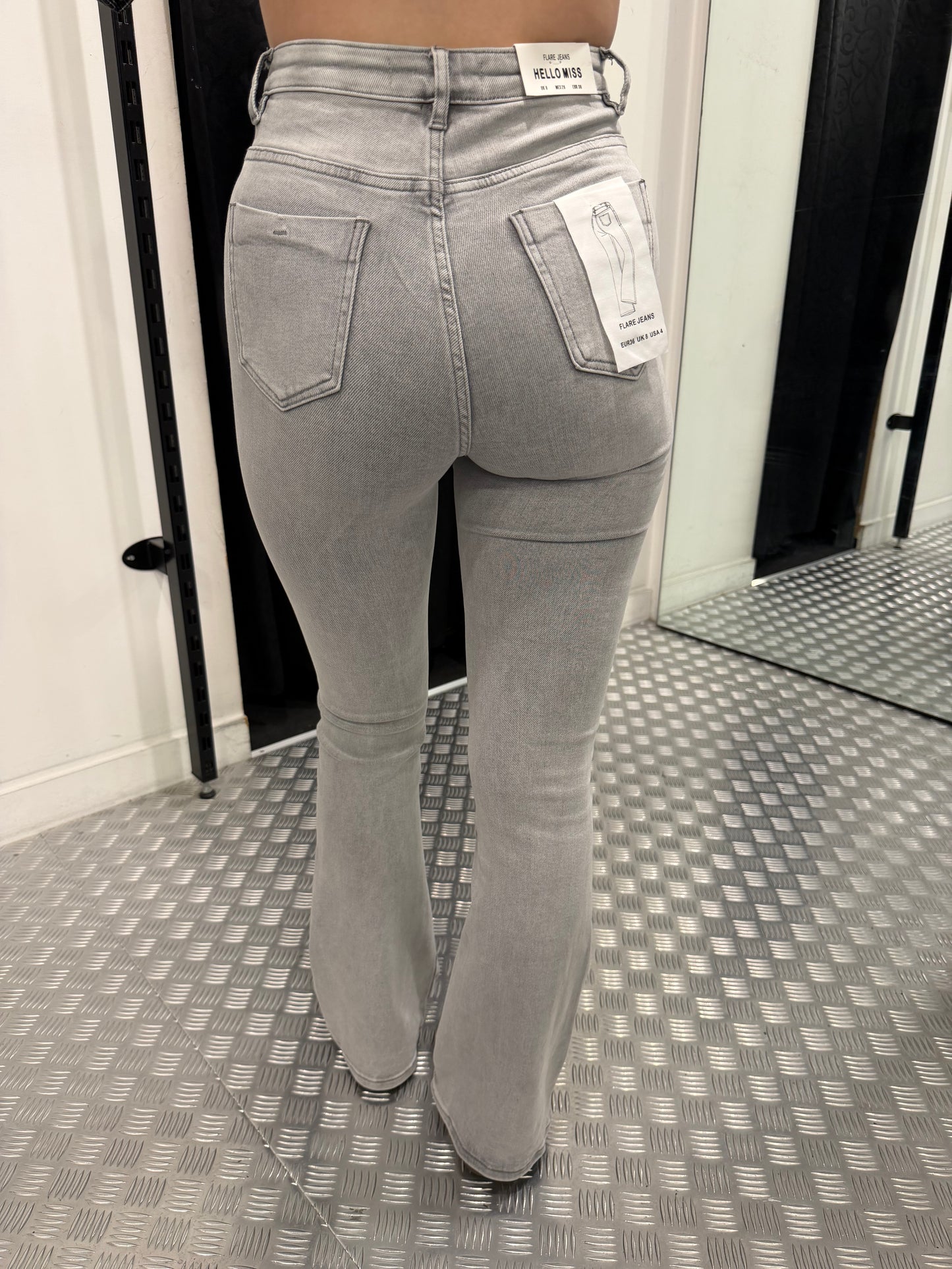 Lichtgrijze flared jeans HM