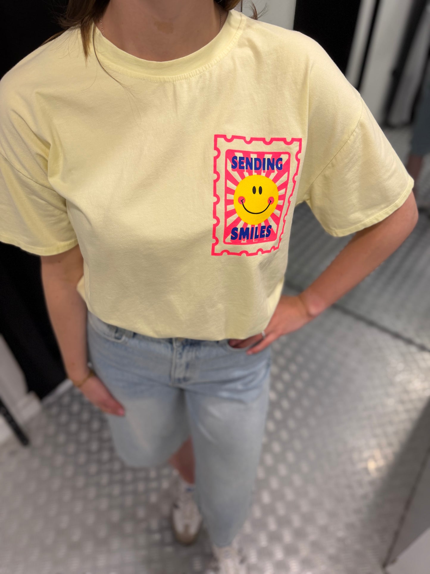 Yellow smiley tshirt