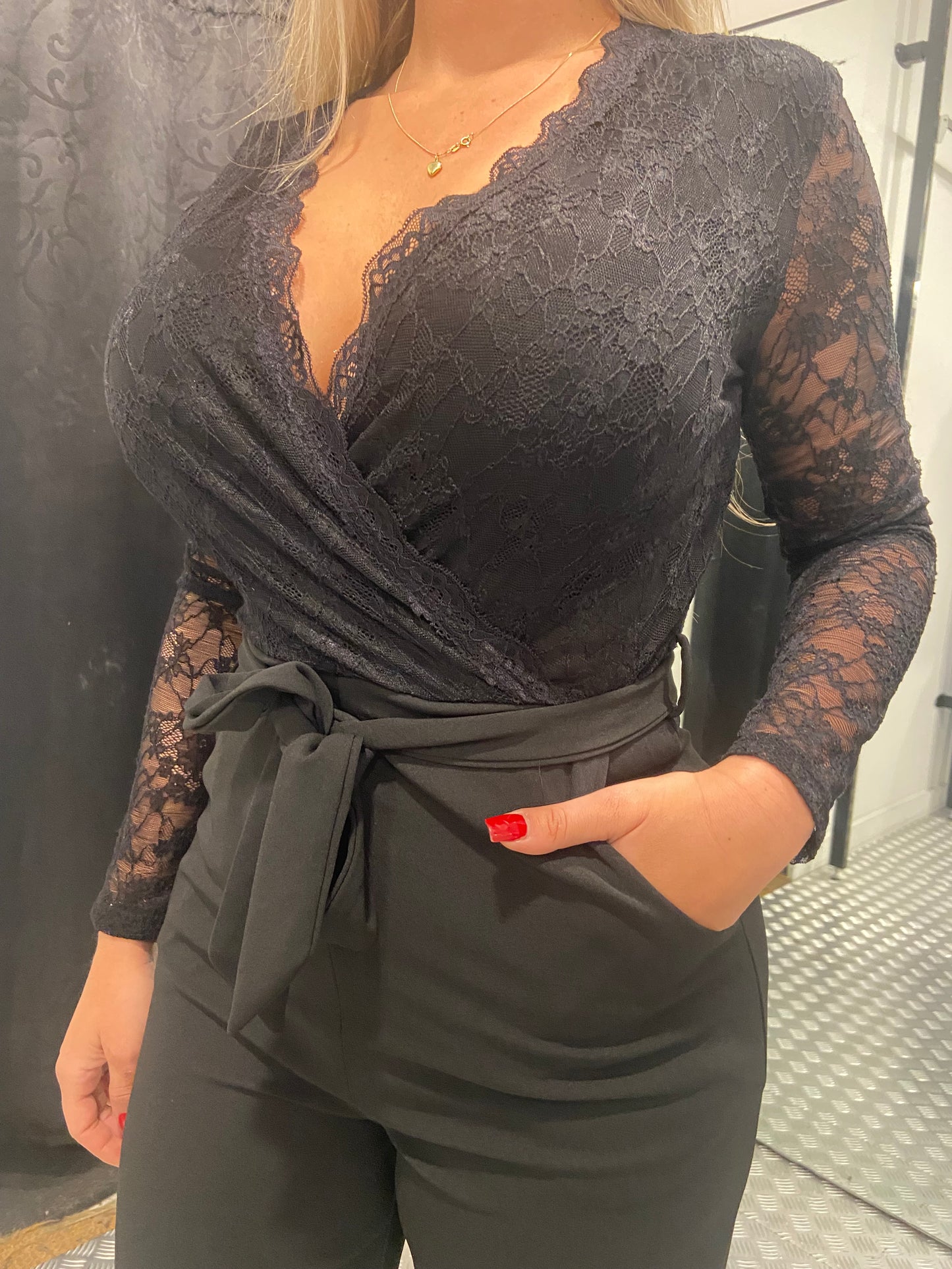 Black lace jumpsuit by swan