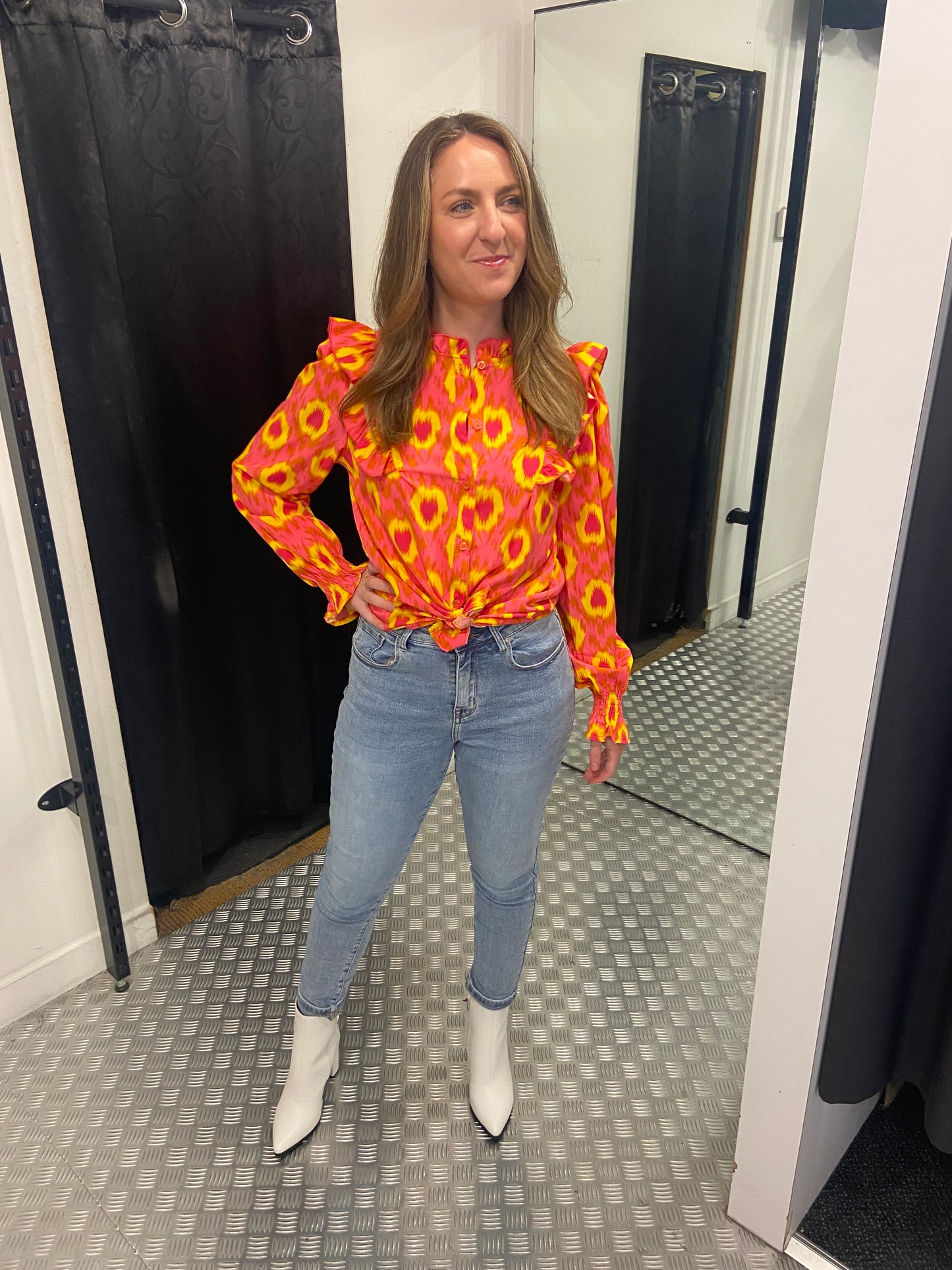 Oranje dessin ruffle blouse