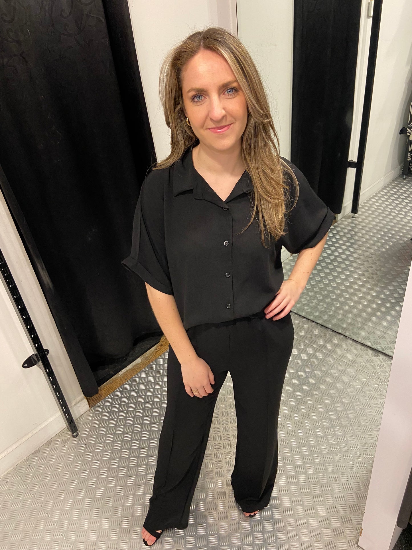 Zwarte blouse met knopen