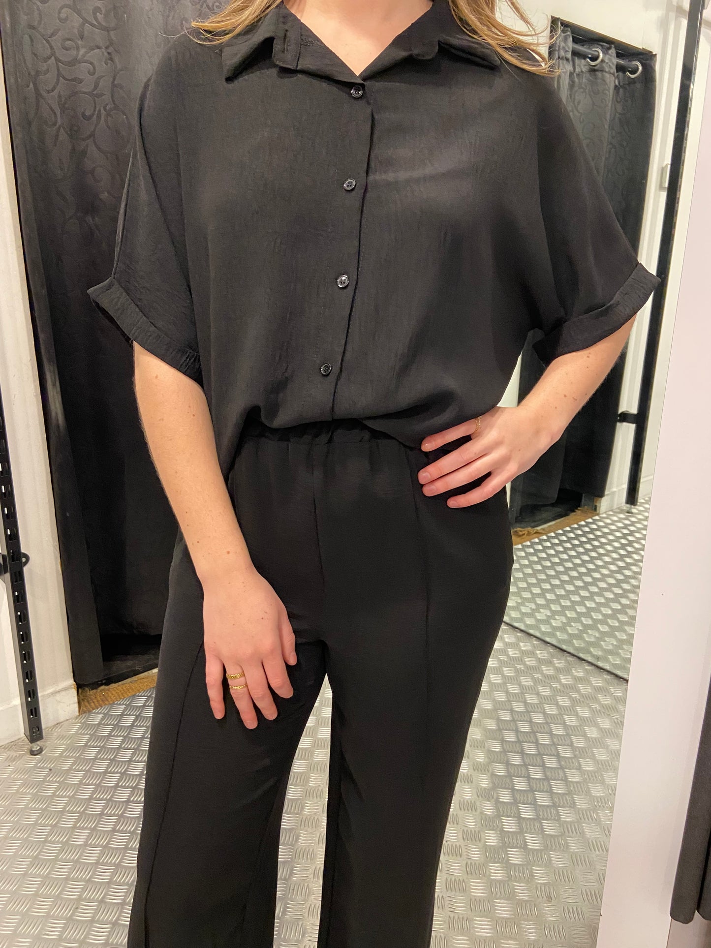 Zwarte blouse met knopen
